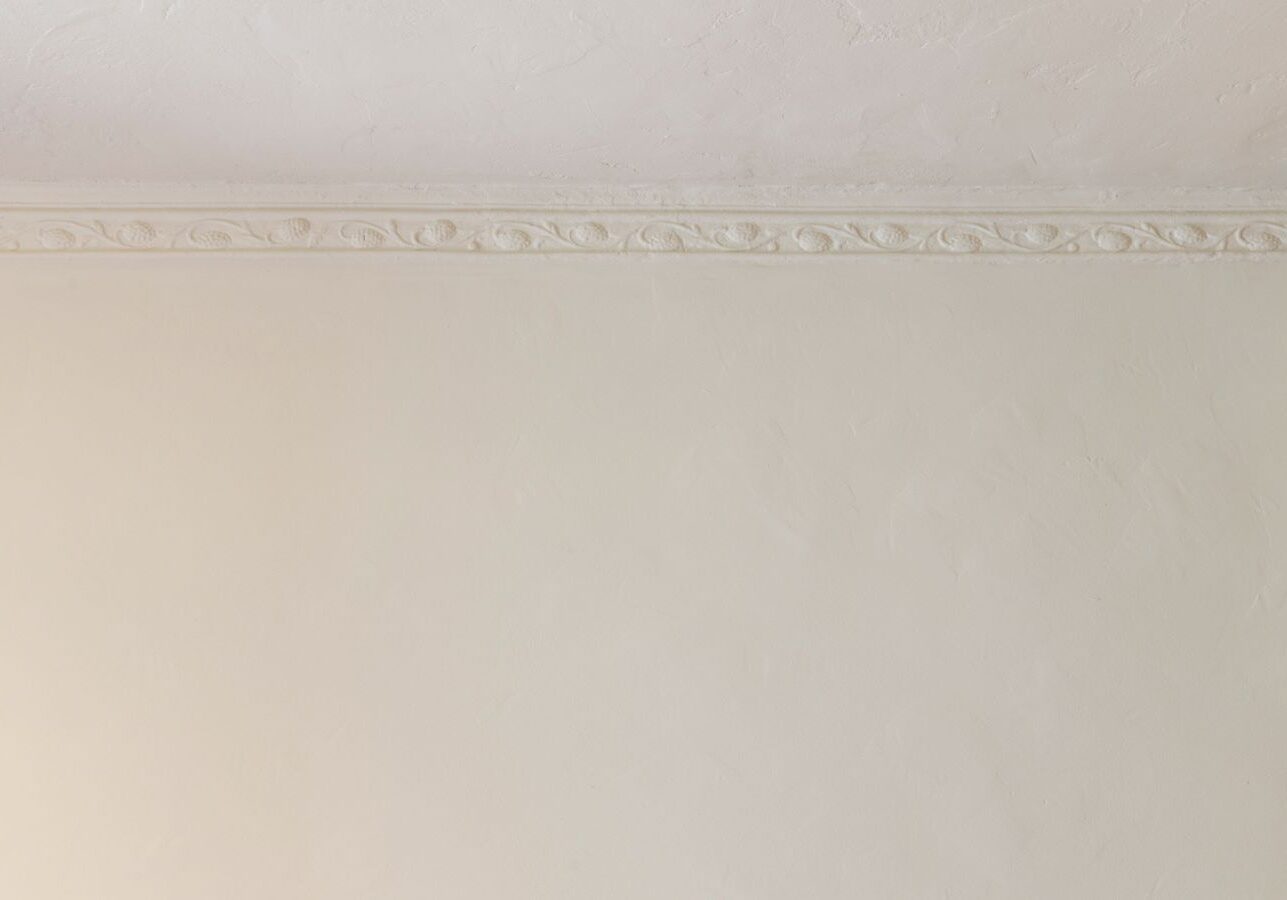 Loft Drywall & Plaster specialist applying texture matching in Monroeville, PA for a clean, blended wall repair.